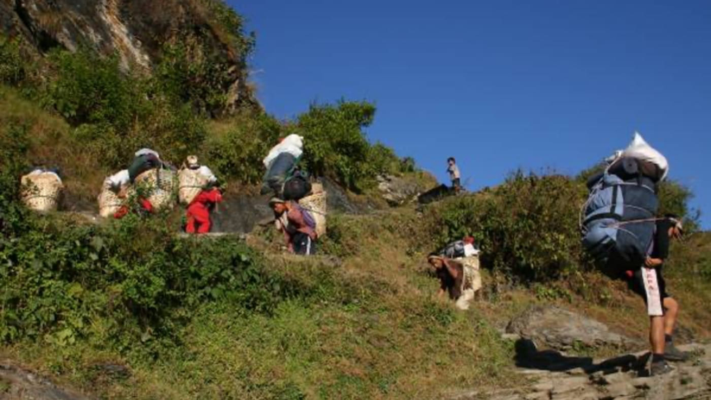 annapurna porters working hard.webp