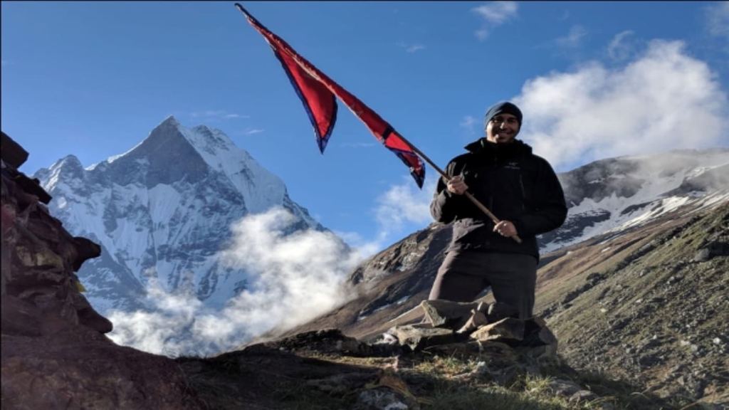 nepali with nepali flag in Annapurna bc.webp