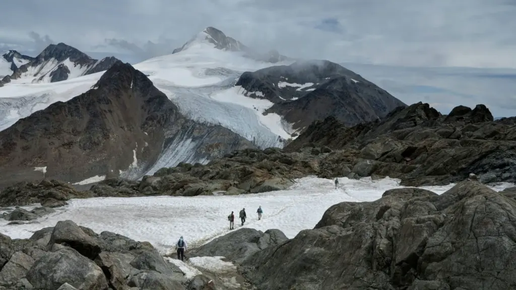 trekking glacial alps.webp